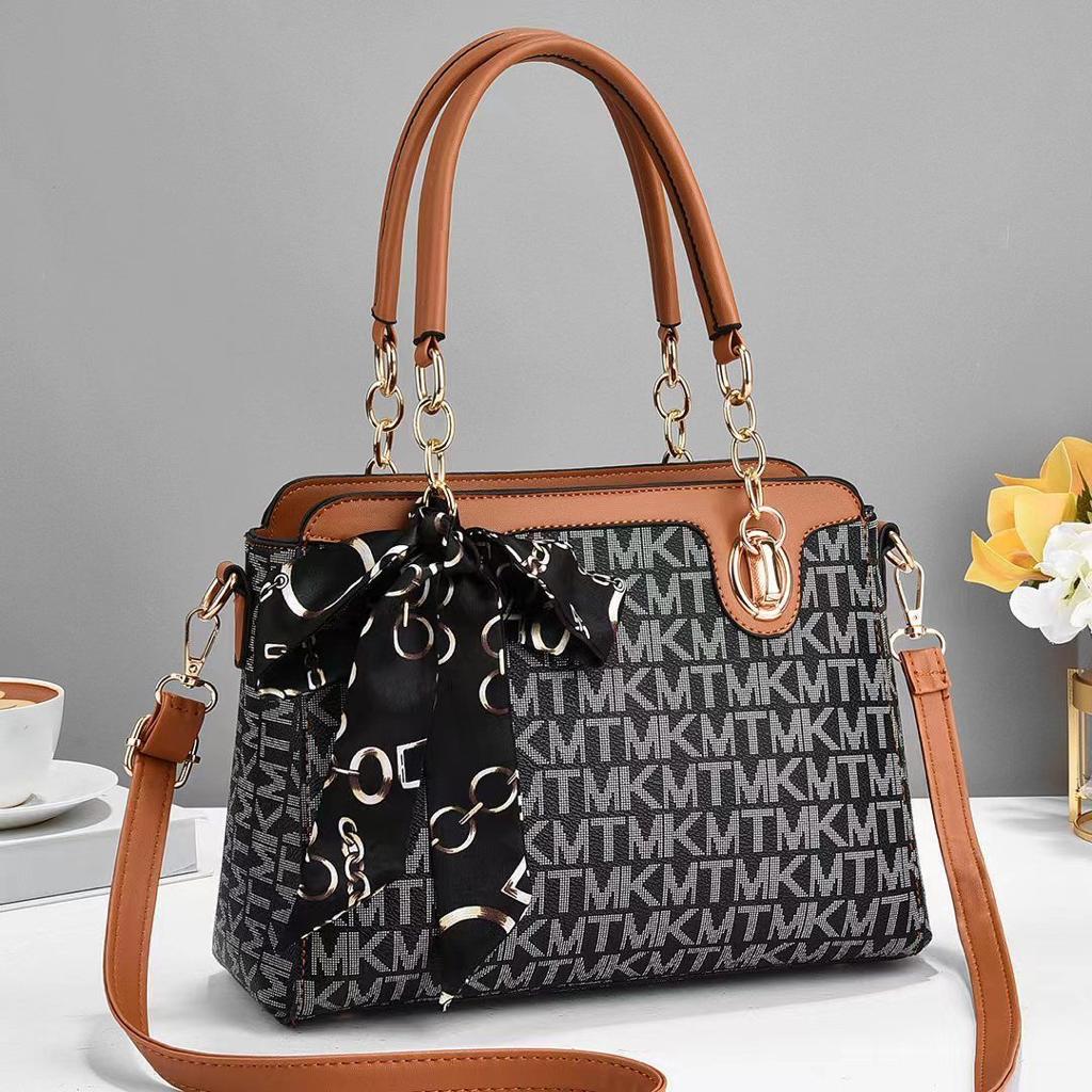 Elegant Versatility: Female Shoulder PU Leather Ladies Handbag with Sling Belt & Keychain